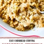 A close-up of Cornbread Stuffing with chopped vegetables in a bowl, a spoon lifting a portion. Text on the image reads “Easy Cornbread Stuffing, The Best Holiday Side Dish.”.