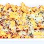 A casserole dish filled with pasta and cheese.