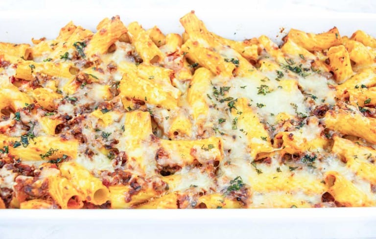 A casserole dish filled with pasta and cheese.