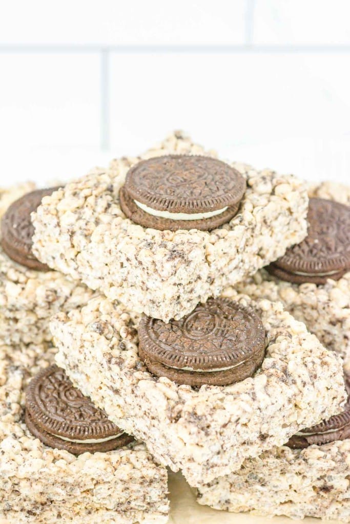 Oreo krispy treats are stacked on top of each other.