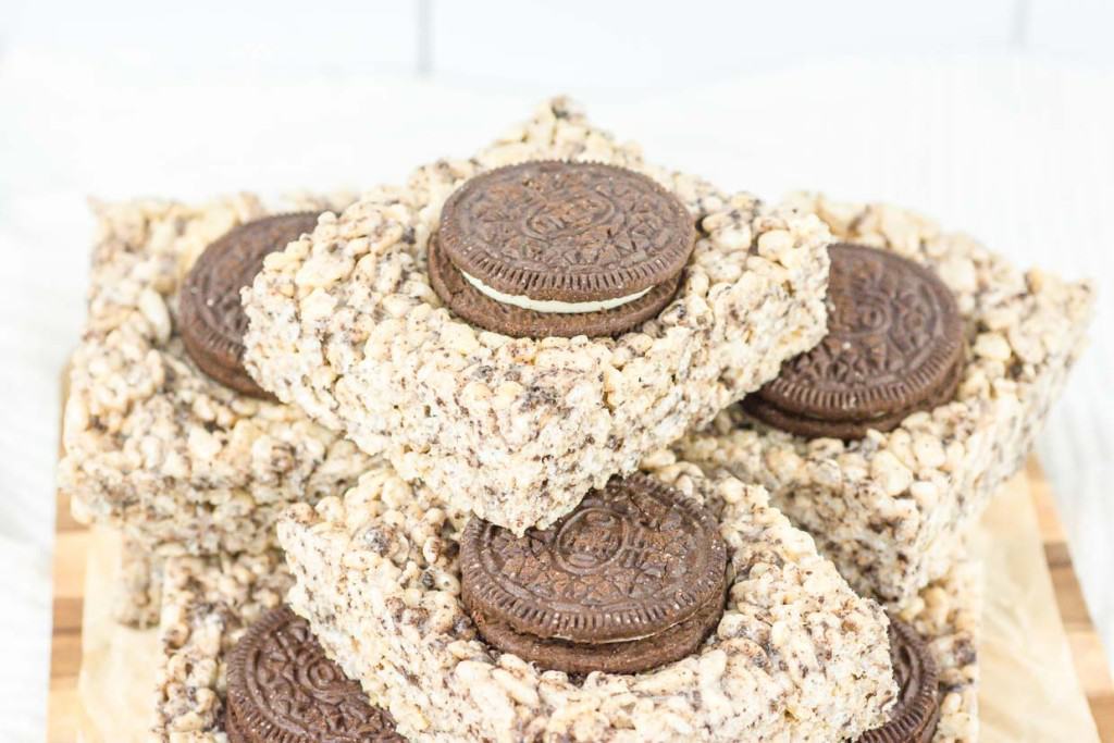 Oreo rice krispy treats are stacked on top of each other.