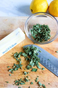 A bowl of chopped herbs.