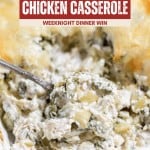 A close-up of Spinach Artichoke Chicken Casserole in a baking dish with a serving spoon, topped with a golden layer of melted cheese.