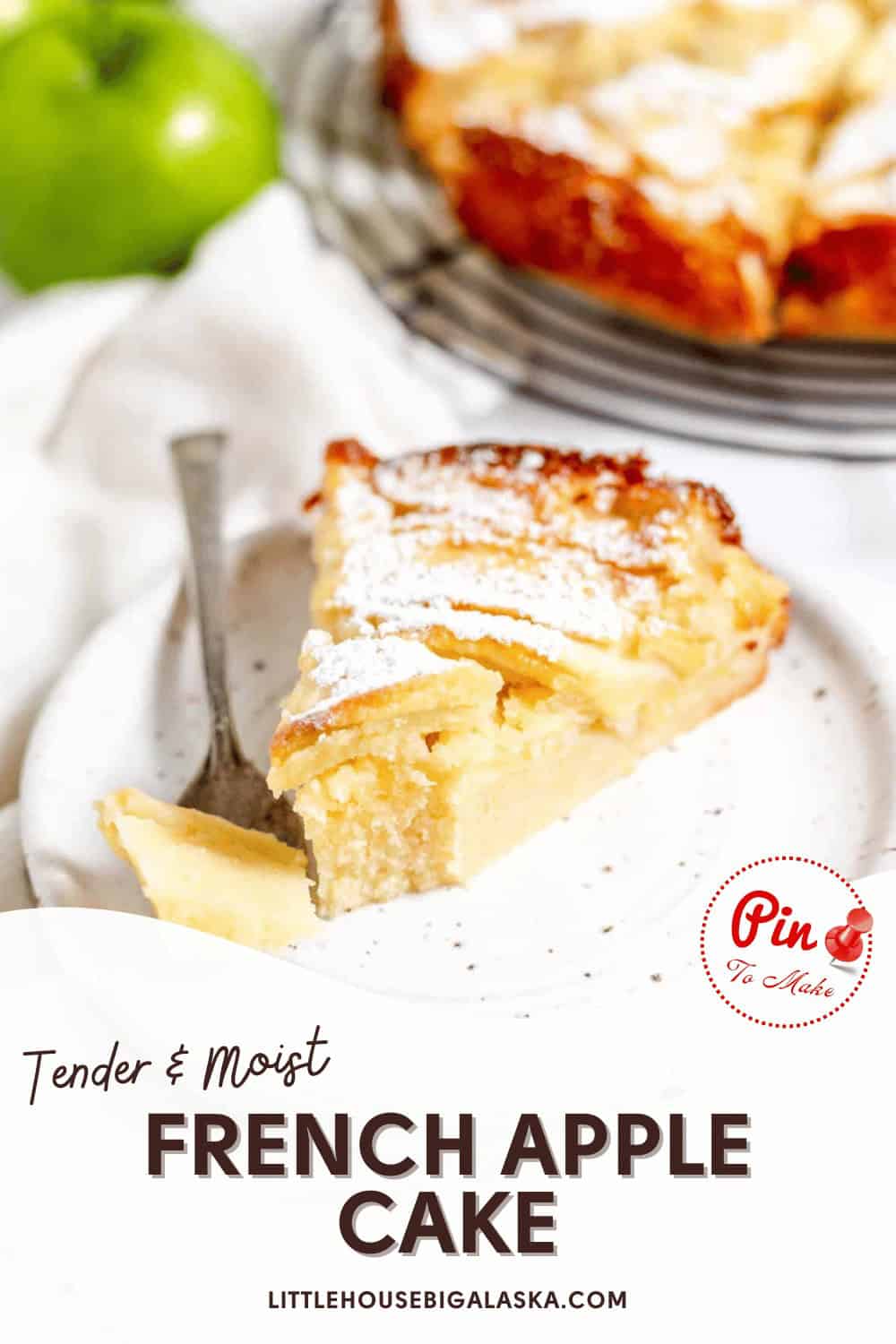 A slice of French apple cake dusted with powdered sugar on a white plate. A fork rests beside the slice. An apple and the rest of the cake are in the background. Text reads "Tender & Moist French Apple Cake.