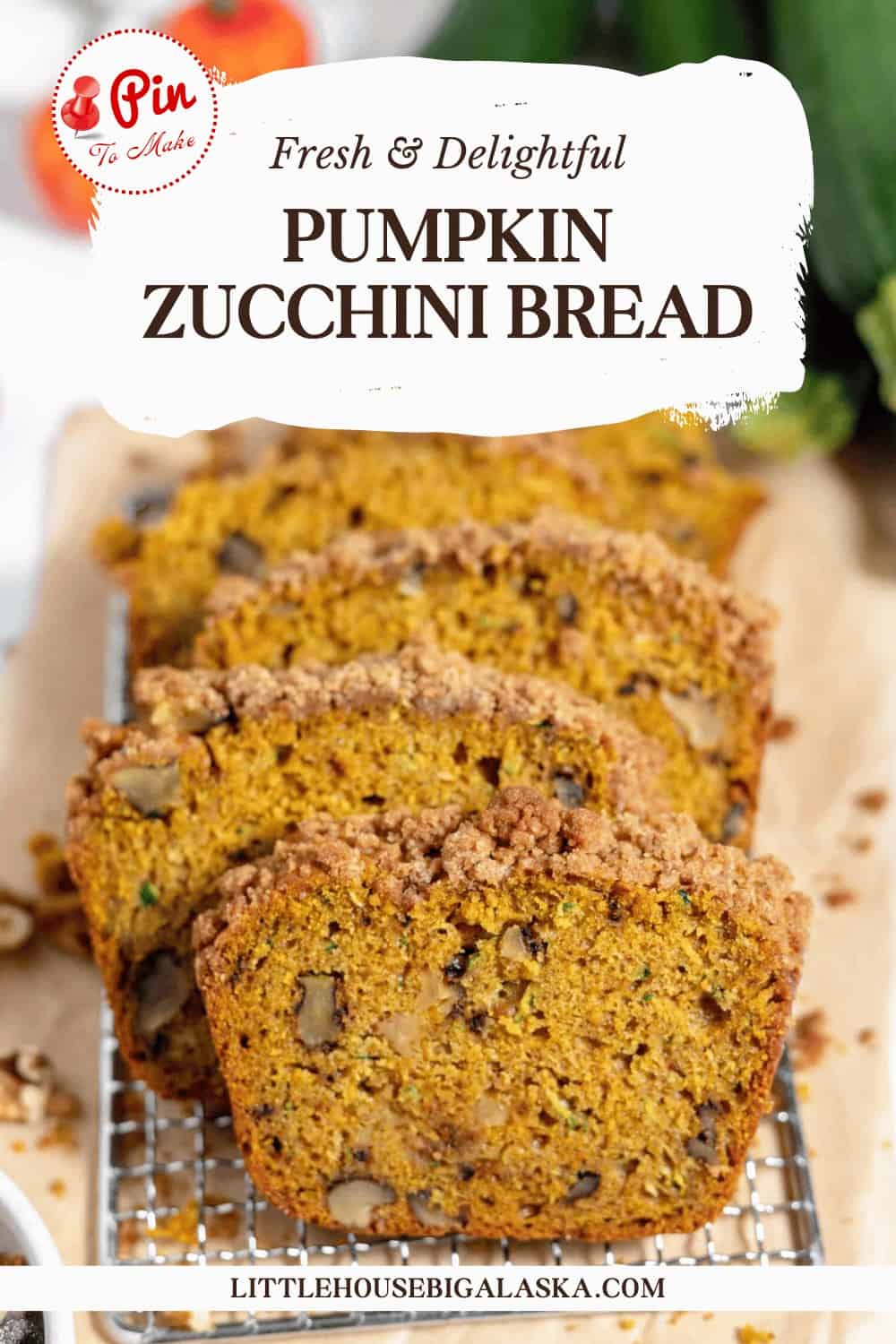 Sliced pumpkin zucchini bread with a crumb topping on a wooden cutting board. Text overlay reads "Fresh & Delightful Pumpkin Zucchini Bread." Website shown at the bottom: littlehousebigalaska.com.