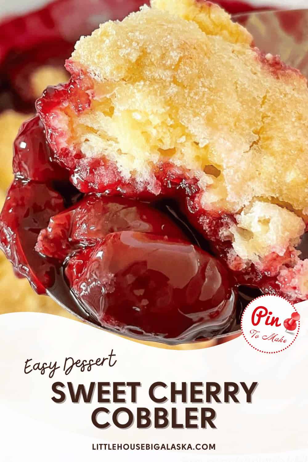 Close-up of a spoonful of sweet cherry cobbler with a golden-brown crust. Text overlay: "Easy Dessert SWEET CHERRY COBBLER" and website "LITTLEHOUSEBIGALASKA.COM".