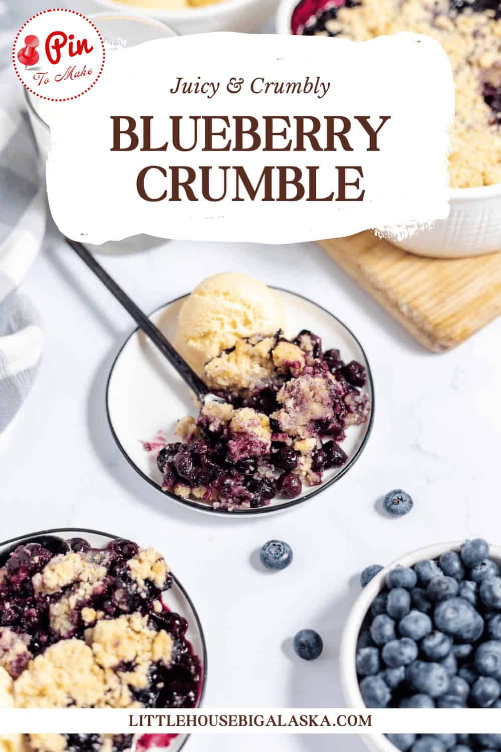 A plate of blueberry crumble served with a scoop of vanilla ice cream. Fresh blueberries and additional servings of crumble are visible on the table. Recipe details are on LittleHouseBigAlaska.com.
