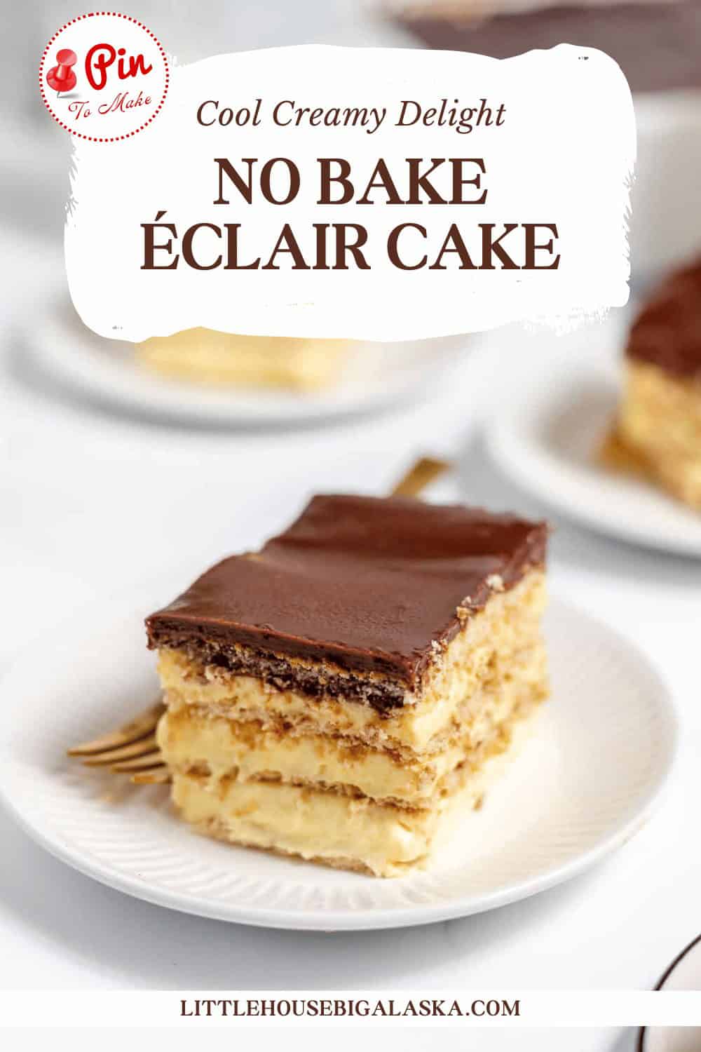 A slice of layered no bake éclair cake with chocolate topping on a white plate with a gold fork. Text above reads "Cool Creamy Delight, No Bake Éclair Cake," and "LITTLEHOUSEBIGALASKA.COM" below.