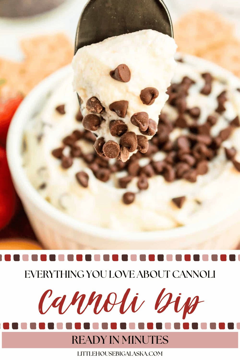 A spoonful of creamy cannoli dip topped with chocolate chips is held above a bowl brimming with more cannoli dip and sweet chocolate chip goodness.