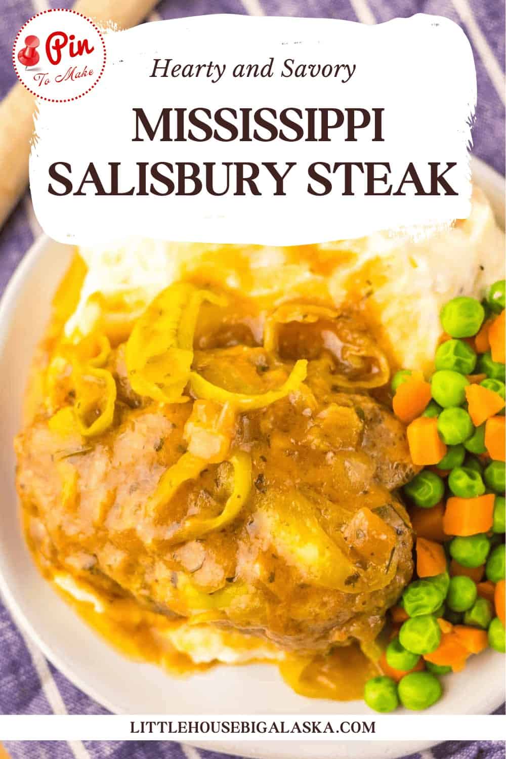 A plate with Mississippi Salisbury steak, mashed potatoes, and mixed peas and carrots, topped with gravy and onions.