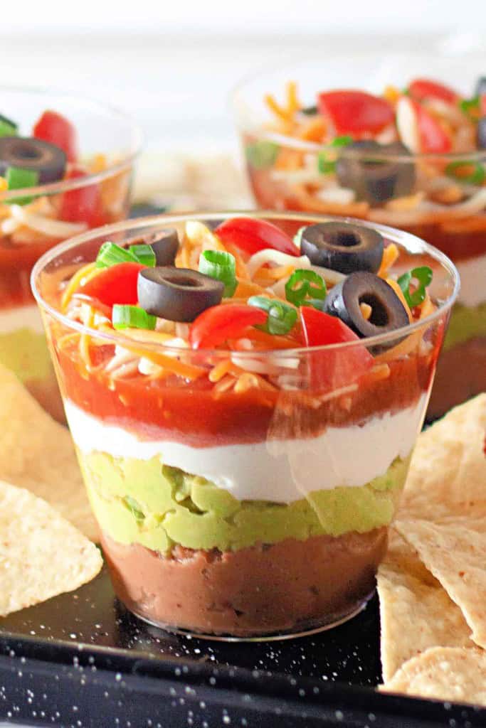 A cup of 7 layer dip. 