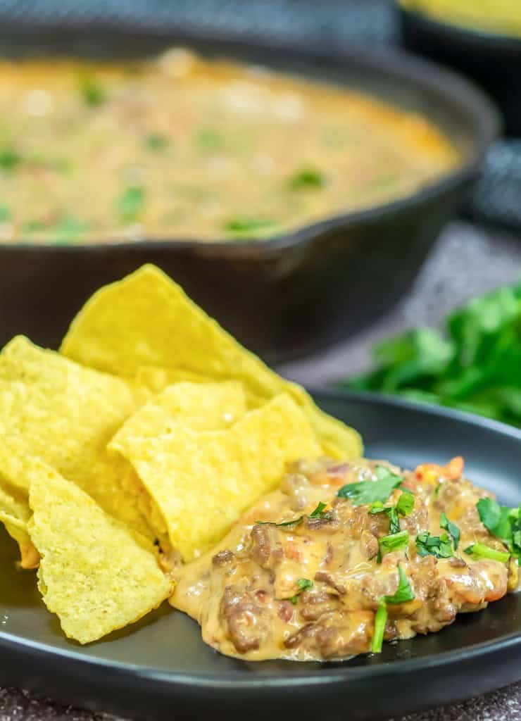 Cheesy dip in a cast iron skillet. 