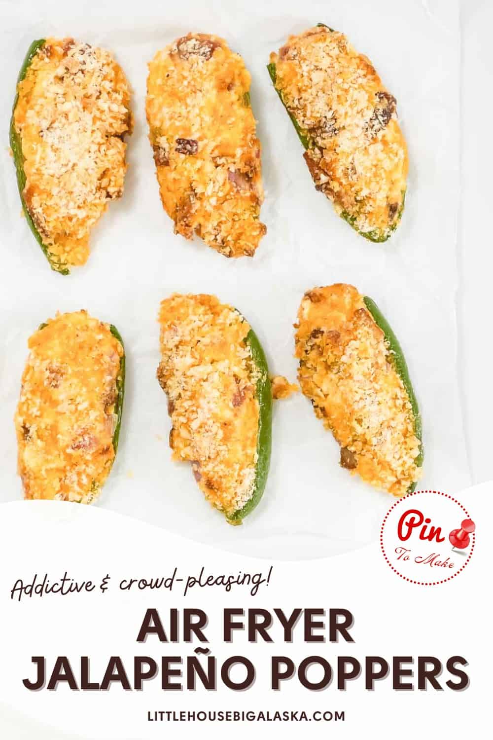 Six air fryer jalapeƱo poppers with a creamy filling are arranged on a white surface.