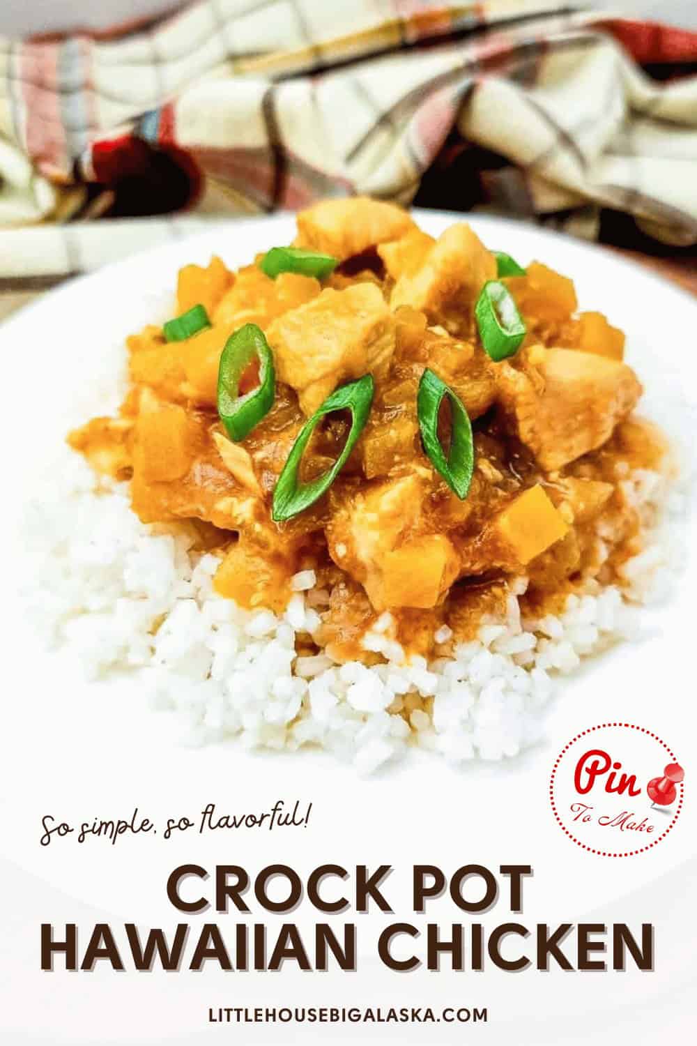 A plate of Crock Pot Hawaiian chicken served over white rice, topped with sliced green onions, with a plaid cloth in the background.