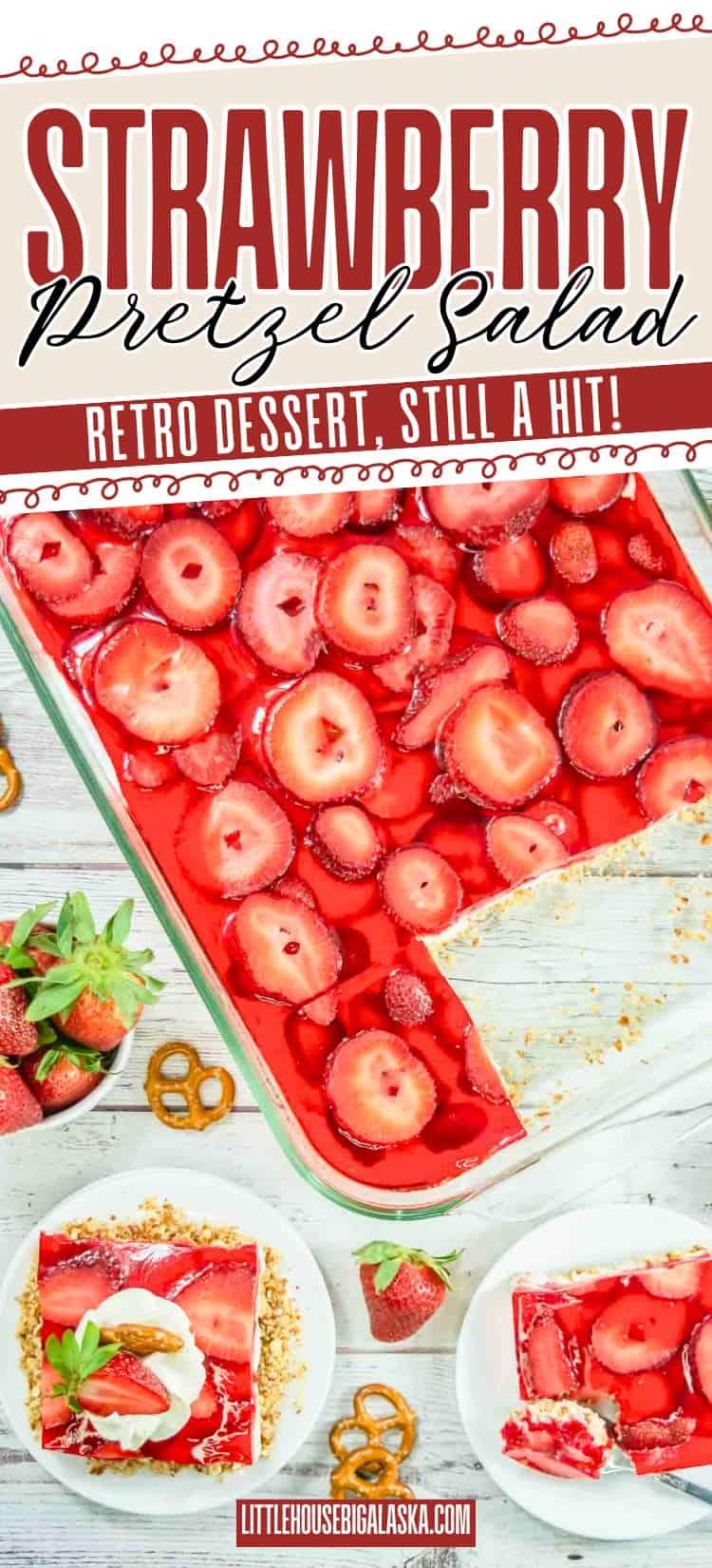 A glass dish of strawberry pretzel salad with strawberry slices on top, a serving on a plate, whole strawberries, and pretzels on a white table.