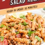 A serving platter filled with taco pasta salad made with rotini, ground meat, tomatoes, and cilantro. Text reads, "Taco Pasta Salad Recipe—your new favorite taco pasta salad dish, ready in under 30 minutes!.