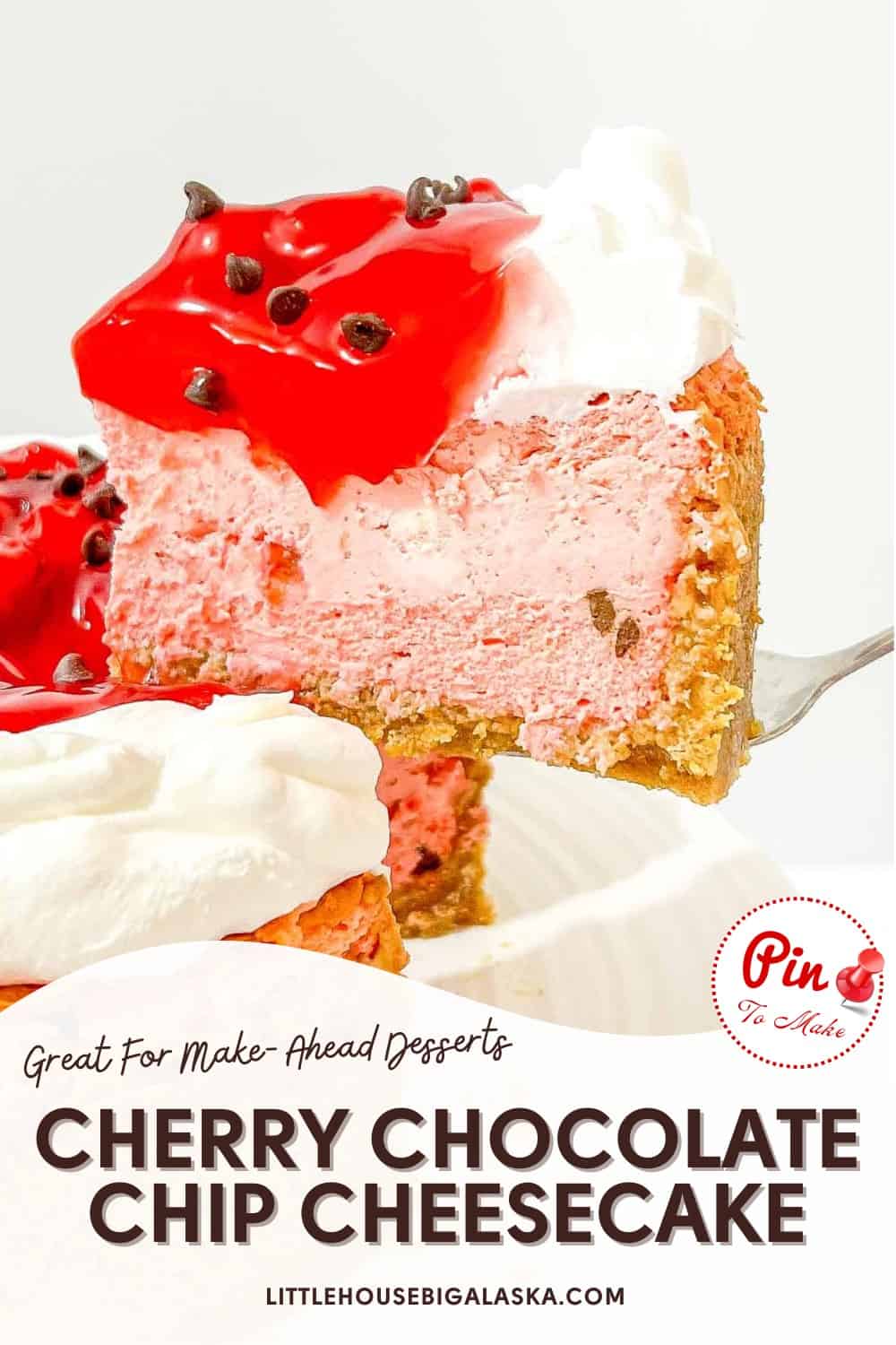 A slice of cherry chocolate chip cheesecake topped with cherry sauce, chocolate chips, and whipped cream, with more cheesecake in the background.