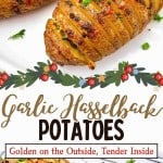 Three Garlic Hasselback Potatoes topped with herbs and baked until golden brown, arranged on a white surface with a festive holiday border. Text overlay reads "Garlic Hasselback Potatoes".