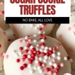 White sugar cookie truffles coated in pink and white sprinkles are arranged closely together. A text overlay invites you to try these delightful sugar cookie truffles.