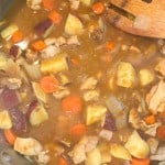 A close-up shot shows chicken curry with chunks of potato, carrot, and onion in a pot.