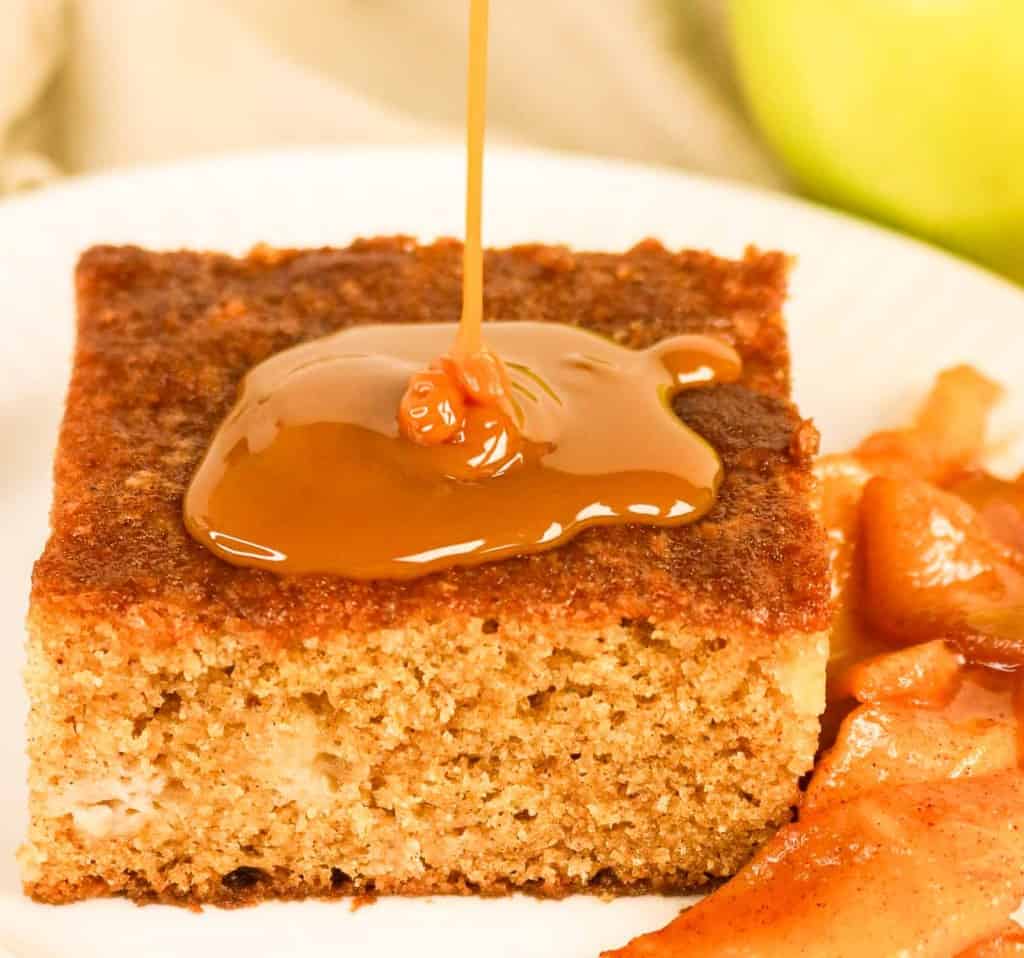 Caramel drizzle on a slice of cake.